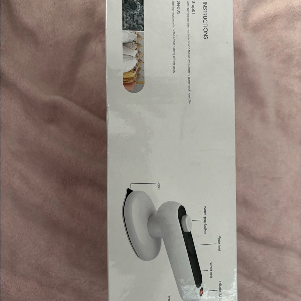 Cream and Black Portable Iron